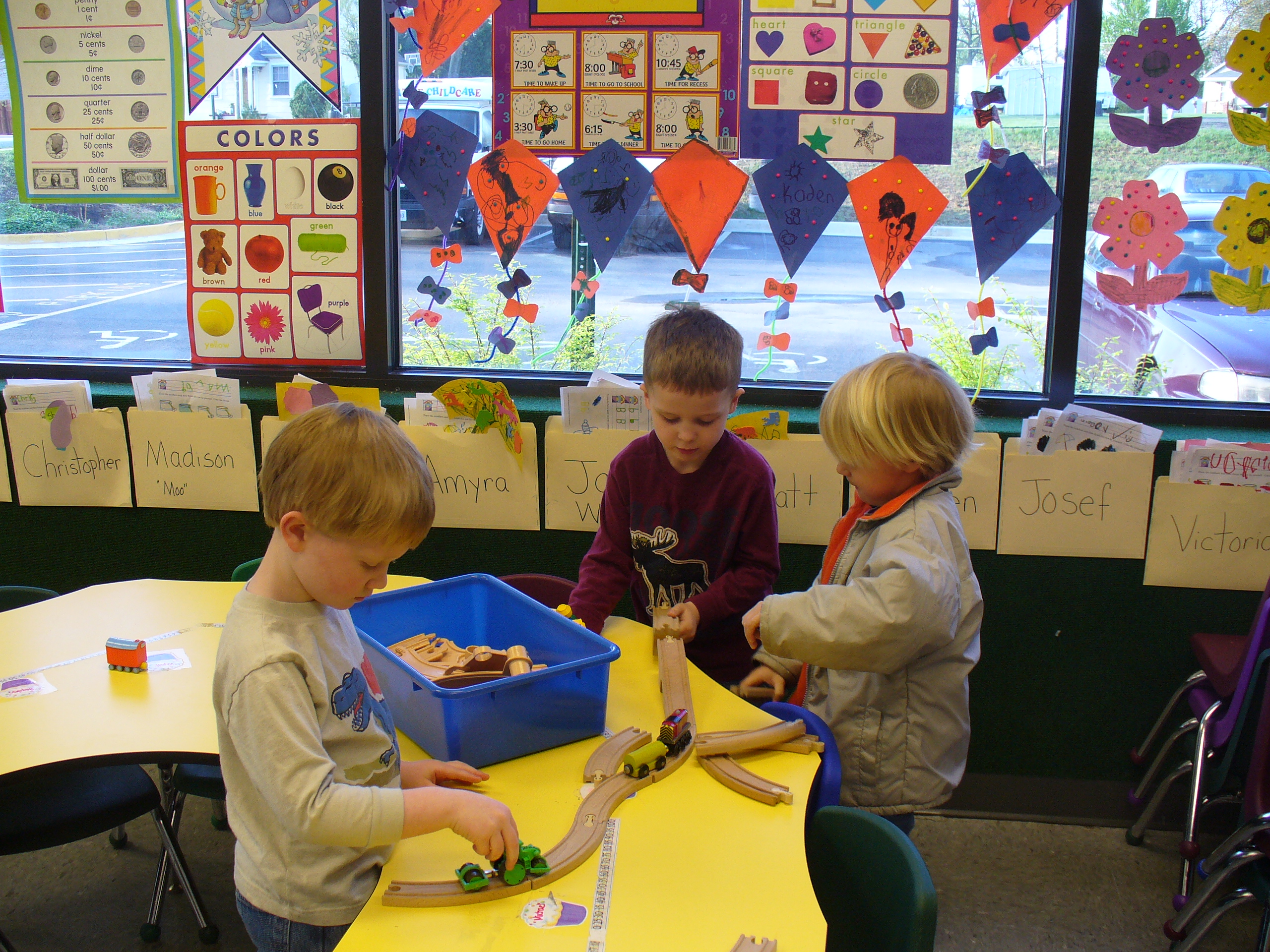 constructing a train track Creative Child Care Academy